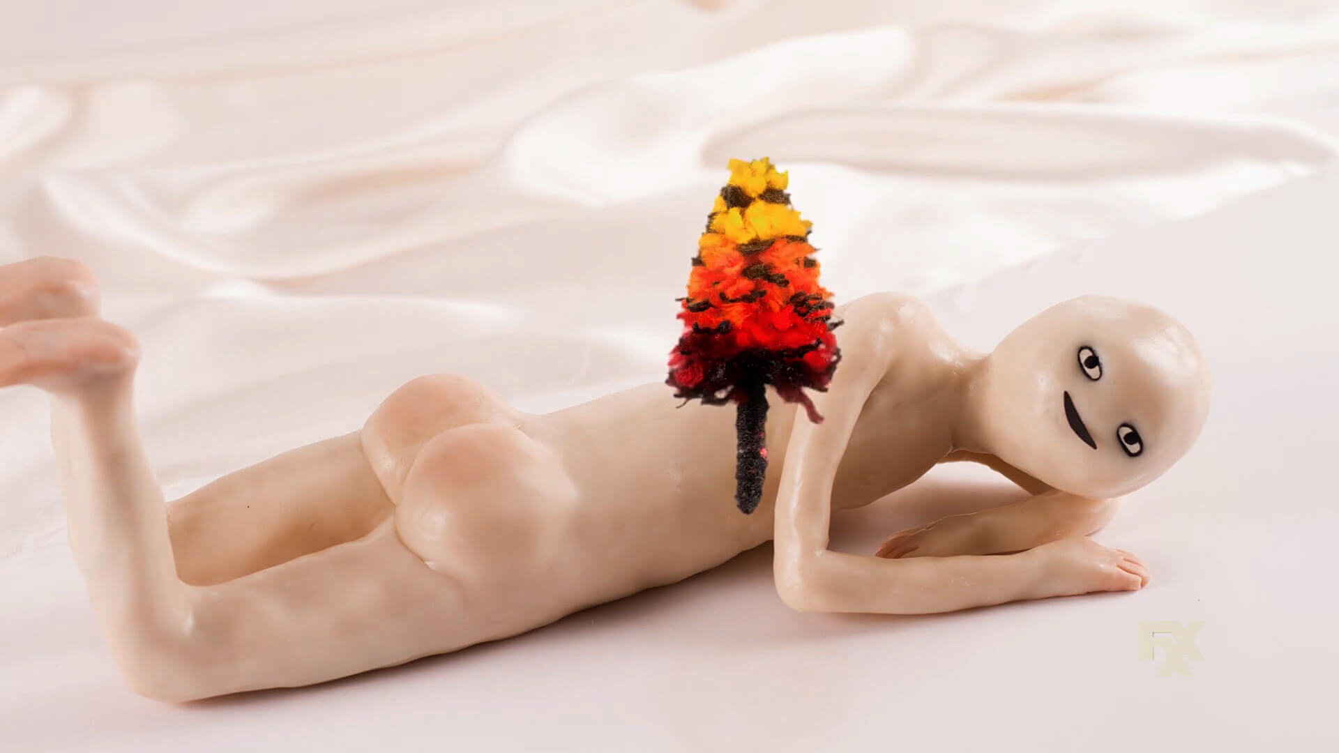 Viral video clip of naked humanoid with a bouquet of flowers