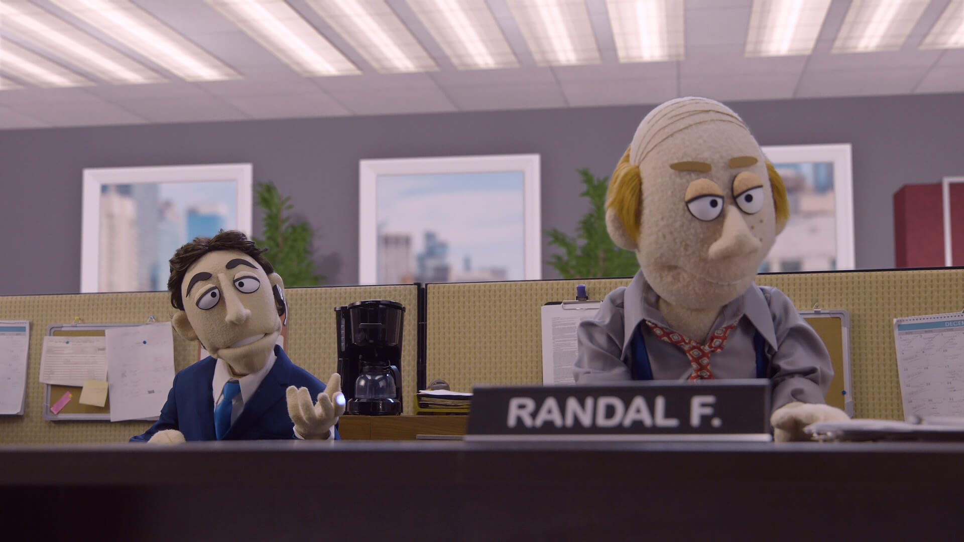 Kevin Nealon taunts his cubicle mate Randal on Comedy Central's Crank Yankers directed by Todd Bishop